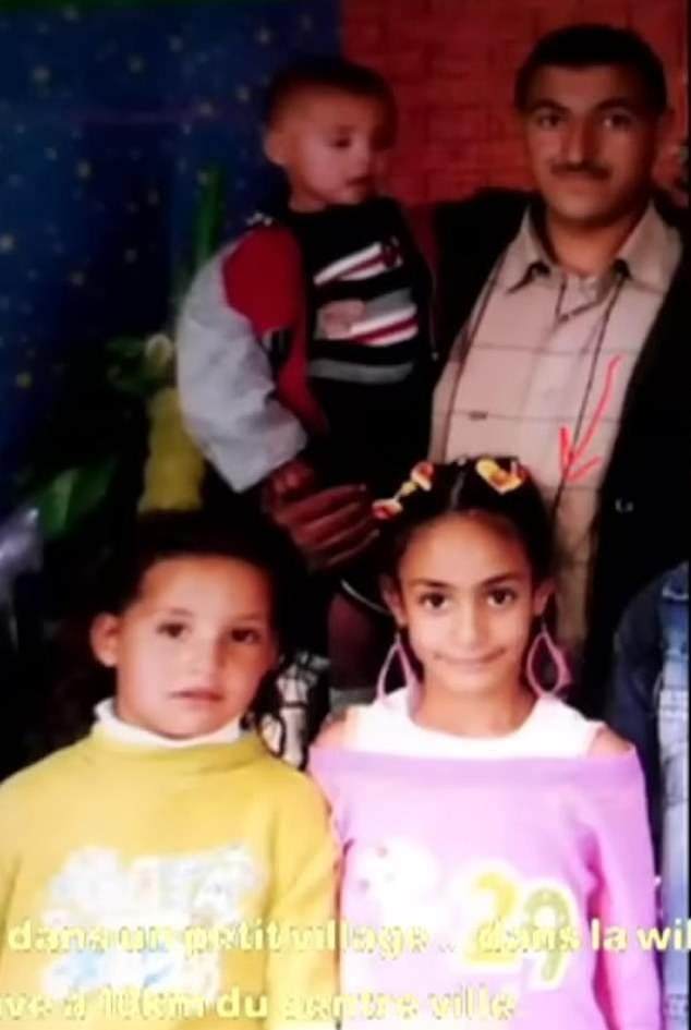 1722871726871099034.jpg 88066885-13708773-Khelif_pictured_front_right_opened_up_about_her_childhood_in_an_-a-24_1722825679333.jpg